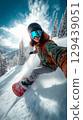 Woman snowboarder carving down a snowy mountain slope winter wonderland action shot outdoor adventure dynamic viewpoint 129439051