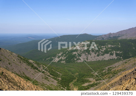 panoramic view of the Northern Ural Mountains, view from the Iovsky Proval Pass in the area of Mount Konzhakovsky Kamen panoramic view of the Northern Ural Mountains, view from the Iovsky Proval Pass in the area of Mount Konzhakovsky Kamen 129439370
