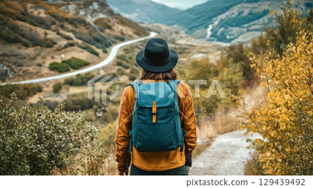 Autumn hiker backpack mountain scenic outdoor adventure travel photography 129439492