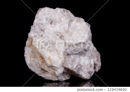 Macro mineral stone Albit on black background 129439692