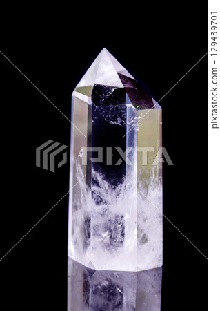 Macro mineral stone Crystal rock crystal on a black background 129439701