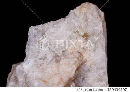 Macro mineral stone Wollastonite on black background Macro mineral stone Wollastonite on black background 129439707