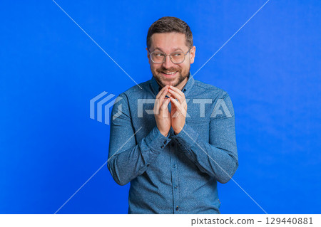 Sneaky cunning mature man thinking over devious villain idea, cheats, jokes, pranks, evil plan Sneaky cunning mature man thinking over devious villain idea, cheats, jokes, pranks, evil plan 129440881