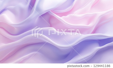 Soft silk fabric draping in gentle waves with pastel pink and purple hues reflecting soft light 129441186