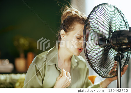Woman Struggling with Unbearable Summer Heat Woman Struggling with Unbearable Summer Heat 129442720