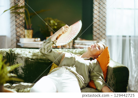 Seeking Relief from Summer Sun Indoors 129442725