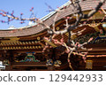 Yushima Tenmangu Shrine in early spring: worship hall and plum tree 129442933