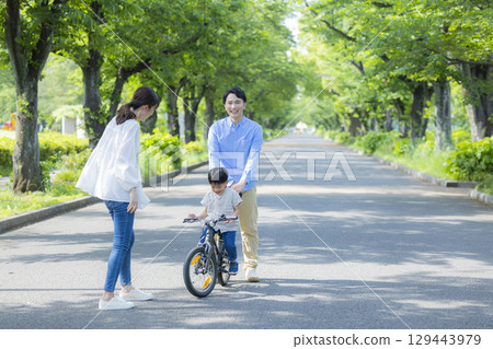 Family walking in the fresh green park Family walking in the fresh green park 129443979