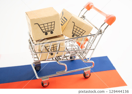 Shopping cart box on Russai flag, import export, finance commerce. 129444136