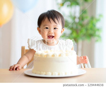 Birthday cake and baby 129444638