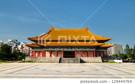 The National Theater in Taipei, Taiwan, is a grand traditional Chinese-style building located at Liberty Square, featuring a vivid orange roof, red columns, and intricate architectural details. The National Theater in Taipei, Taiwan, is a grand traditional Chinese-style building located at Liberty Square, featuring a vivid orange roof, red columns, and intricate architectural details. 129444764