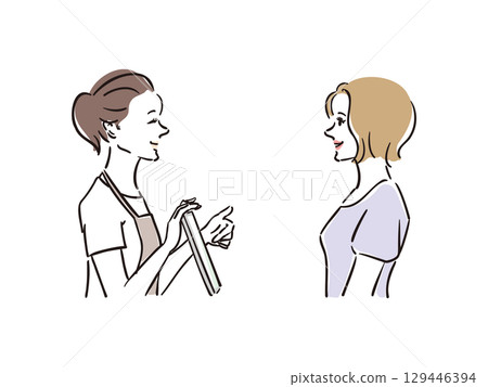 A woman consulting with a counselor at a beauty salon 129446394