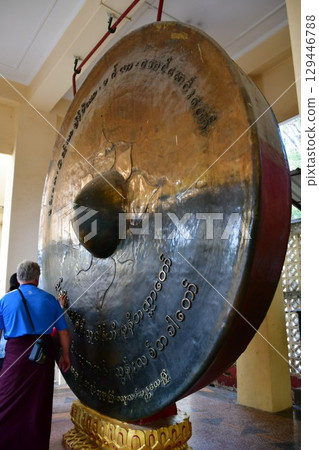 Giant gong at Mahamuni Pagoda, Mandalay, Myanmar 129446788