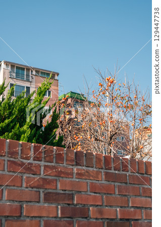 Bukchon Hanok Village autumn street in Seoul, Korea 129447738