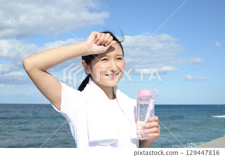 woman hydrating woman hydrating 129447816