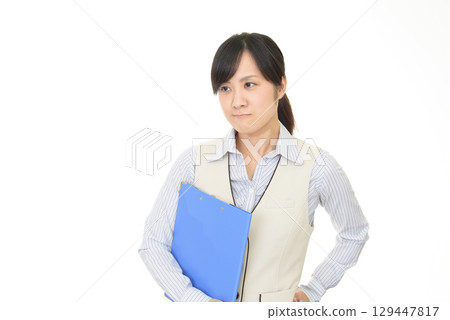 Female employee with a dissatisfied face Female employee with a dissatisfied face 129447817