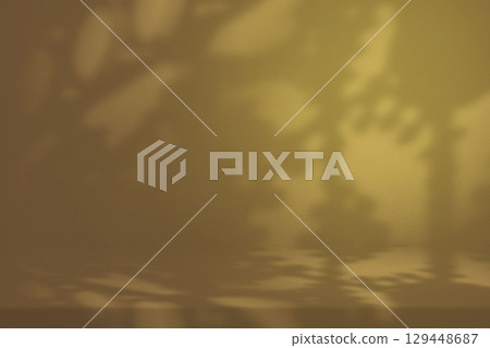Stucco Table with Vintage Fence Shadow on Concrete Wall Texture Background in Dark Orange Tone 129448687