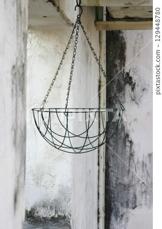 Wire basket in the entryway 129448780