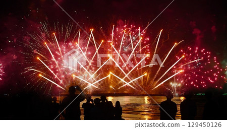 Red Firework celebrate anniversary happy new year 2024, 4th of july holiday festival. red firework in night time celebrate national holiday. Countdown to new year 2024 festival party time event 129450126