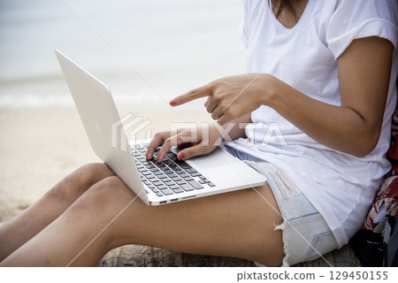 Woman typing laptop computer online meeting at home office work from home. Asian business woman using notebook laptop lifestyle. Happy programmer woman typing keyboard laptop read online website Woman typing laptop computer online meeting at home office work from home. Asian business woman using notebook laptop lifestyle. Happy programmer woman typing keyboard laptop read online website 129450155
