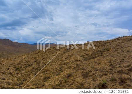 Arid hillsides mountains in Sonoran Desert near Sunflower, Arizona landscape of Maricopa County desert ecosystem along Beeline Highway area 129451881