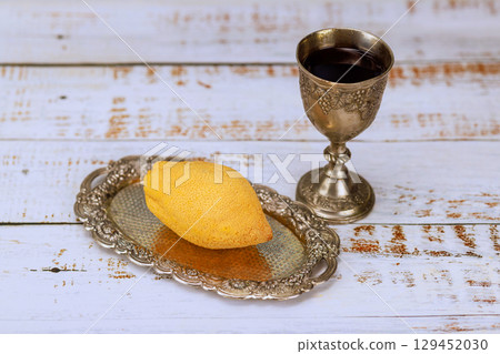Traditional Jewish holiday for Sukkot celebration featuring etrog citron fruit during Jewish harvest festival. 129452030