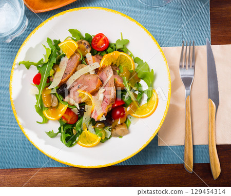 Appetizing poultry salad with duck breast Appetizing poultry salad with duck breast 129454314