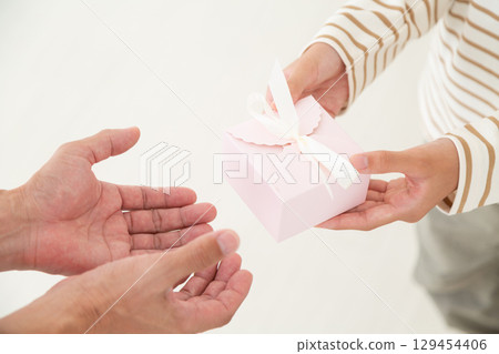 Middle school girl with a gift 129454406