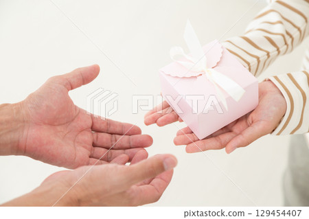 Middle school girl with a gift 129454407