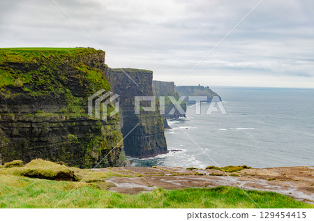 Cliffs of Moher: A series of cliffs overlooking the Atlantic Ocean (Ireland) 129454415