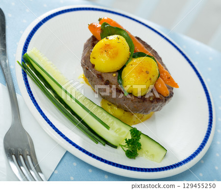Beef rissole with new potatoes and carrot Beef rissole with new potatoes and carrot 129455250