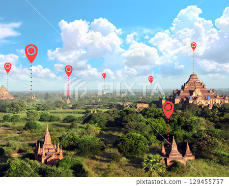 Planning tourist trip in Bagan, Myanmar. Top view on ancient stupas in Pagan, Burma and location pins. Global positioning system pin map. Travel way, point navigation. Modern travel, sightsee, tourism 129455757