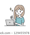 A woman doing a thumbs up in front of a computer 129455978