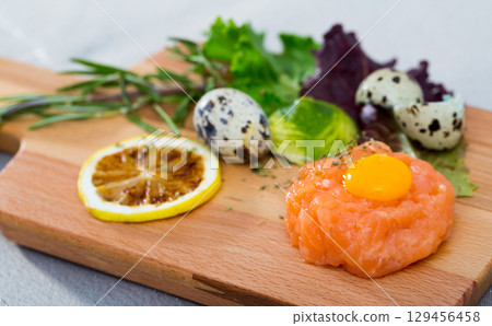 Fresh salmon tartare 129456458