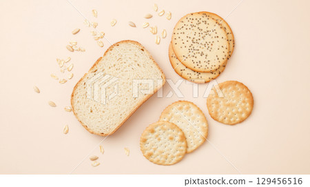 Diet breads assortment with seed loaf on pastel background, copy space 129456516