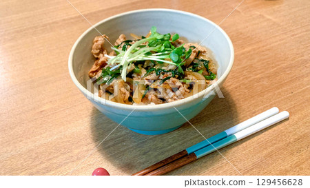 Pork bowl with radish sprouts and grilled meat sauce Pork bowl with radish sprouts and grilled meat sauce 129456628