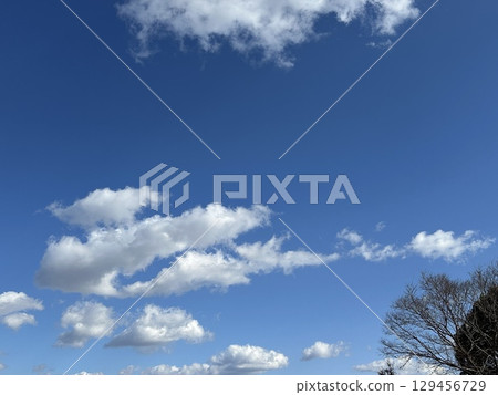 Winter blue sky and white clouds 129456729