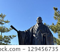 The statue of Taira no Kiyomori on Miyajima with a blue sky in the background 129456735