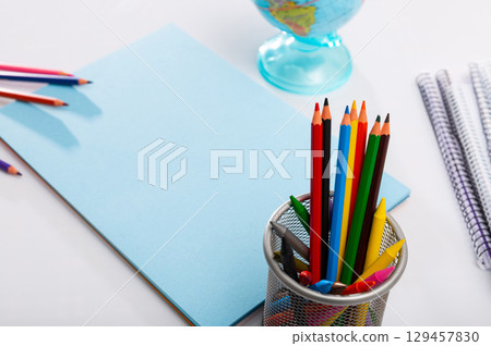 School and office supplies on grey table 129457830