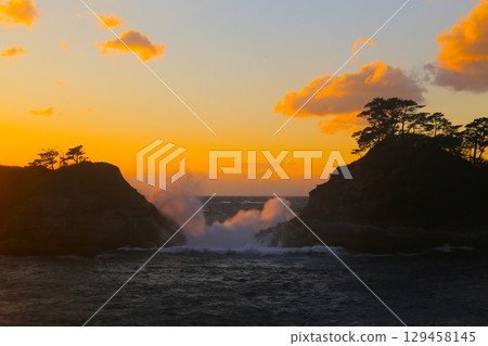 A beautiful sunset over Dogashima 129458145