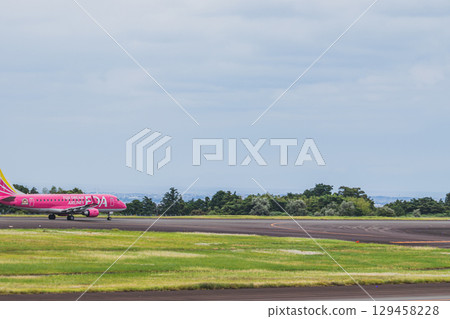 An airplane running on the runway at Mt. Fuji Shizuoka Airport in Makinohara City (Shizuoka Prefecture) An airplane running on the runway at Mt. Fuji Shizuoka Airport in Makinohara City (Shizuoka Prefecture) 129458228