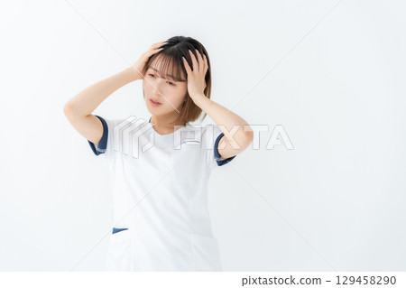 Woman, white coat, nurse, medical, worries 129458290