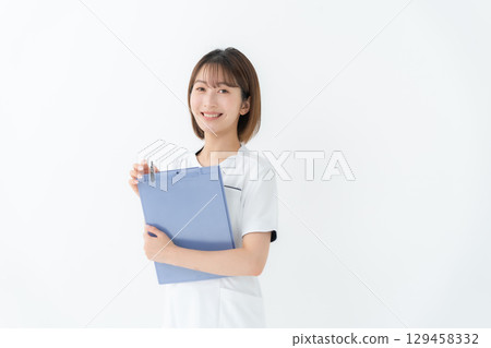 Female white coat nurse medical chart 129458332