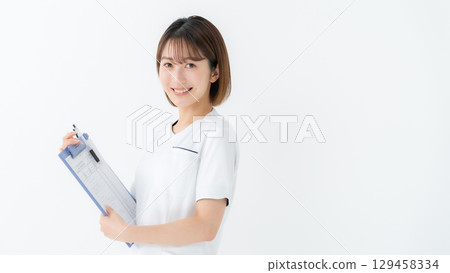Female white coat nurse medical chart Female white coat nurse medical chart 129458334