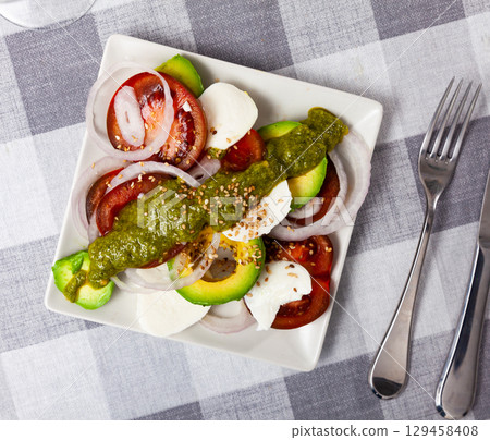 Delicious Caprese salad 129458408