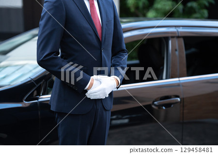 Driver white gloves 129458481