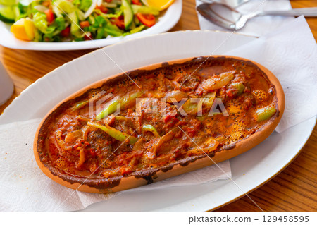 Izmir kofte, turkish dish of spicy meatballs Izmir kofte, turkish dish of spicy meatballs 129458595