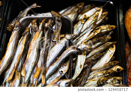 Assortment of cured fish in russian food store 129458717