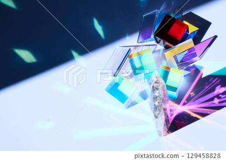 Colorful Prisms. Colorful glass prisms casting vibrant reflections and refractions Colorful Prisms. Colorful glass prisms casting vibrant reflections and refractions 129458828