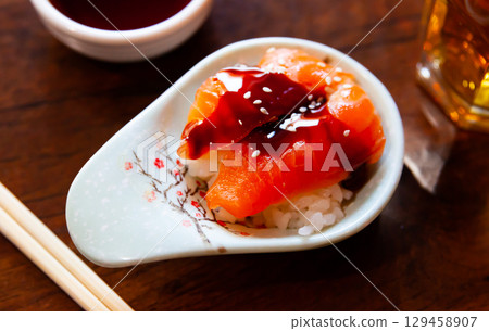 Chirashi - scattered rice with salmon 129458907
